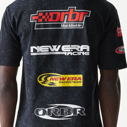 The model is wearing this Red Bull Racing Graphic Oversized T-Shirt in black. 7