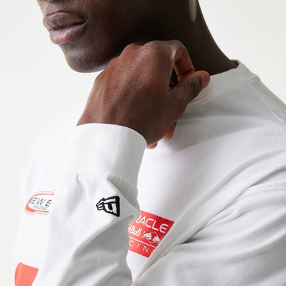 The model is wearing this Red Bull Racing Graphic Long Sleeve T-Shirt in white. 8