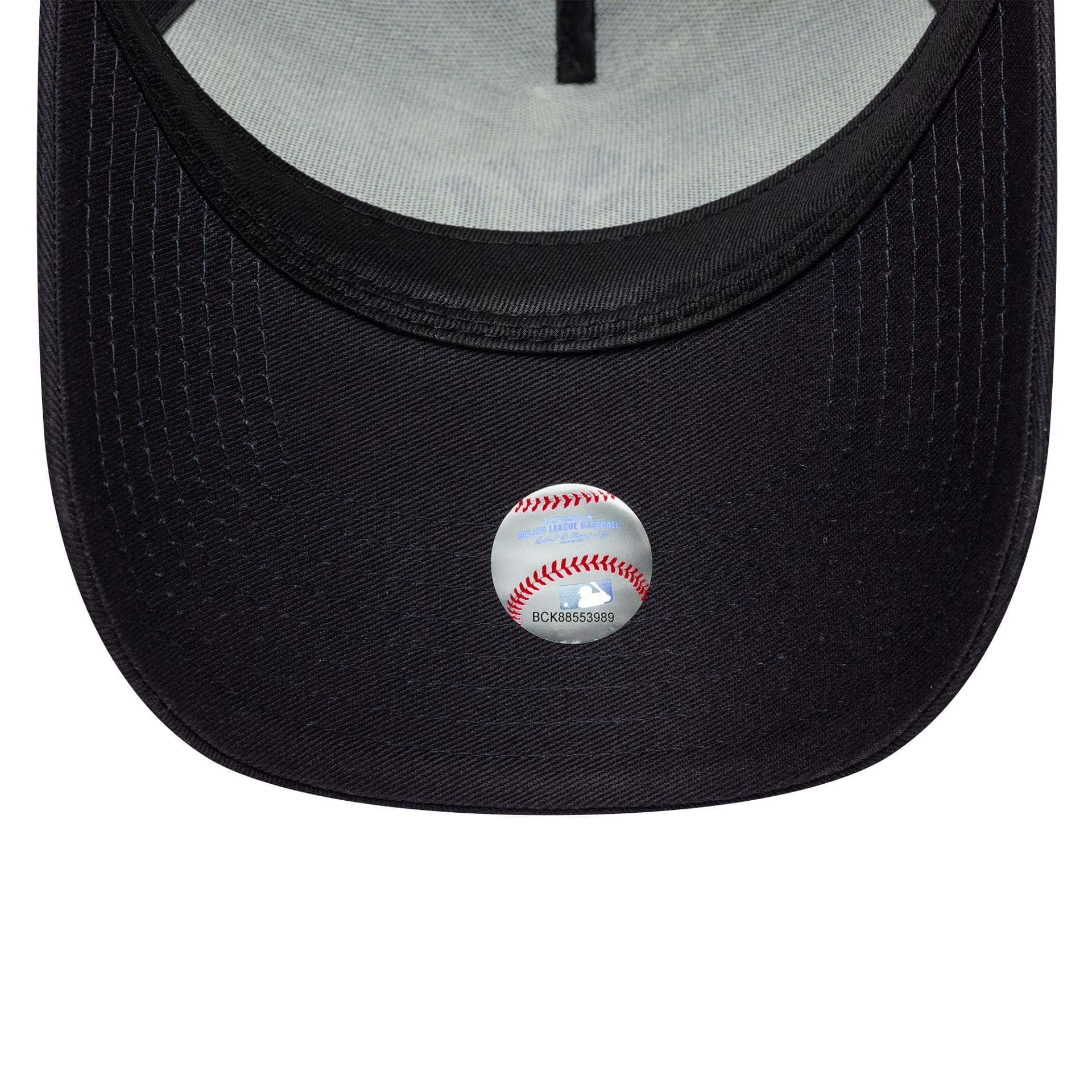 Pictured is this MLB Outline New York Yankees 9FORTY E-Frame Trucker in navy. 5