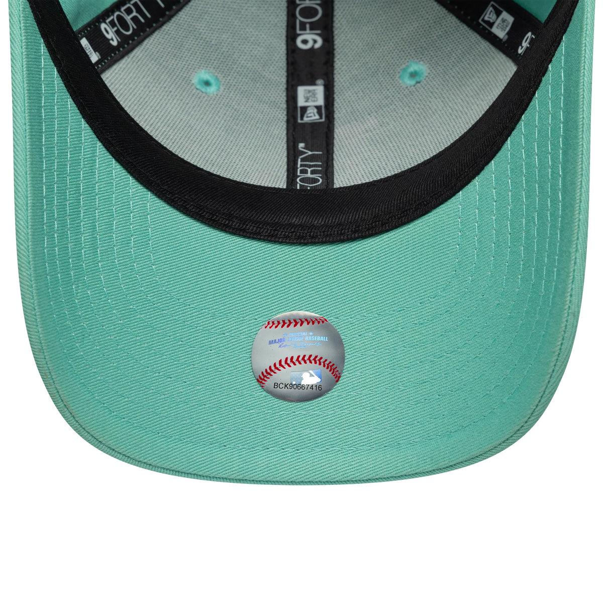 LA Dodgers Youth MLB League Essential Pastel Green New Era 9FORTY Cap, inside view showing the black sweatband with branded taping, a light green undervisor and a baseball themed sticker at the centre.