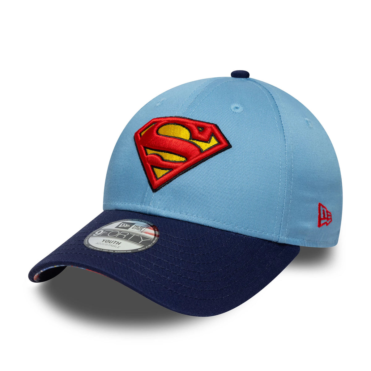 Youth DC Superman Pastel Blue New Era 9FORTY Cap, three-quarter view showing the red and yellow Superman logo embroidered on the front panel, with a contrasting dark blue visor and a 9FORTY size sticker.