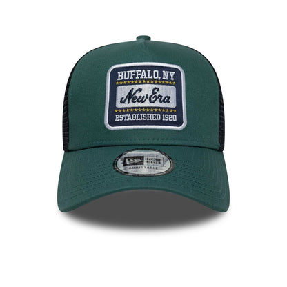 Pictured is this New Era Patch 9FORTY A-Frame Trucker in dark green. 2