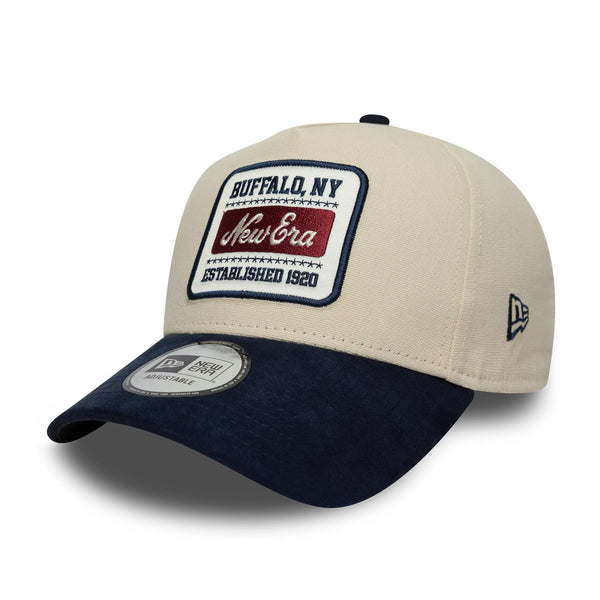 Pictured is this New Era Patch Suede 9FORTY E-Frame in cream & navy. 1
