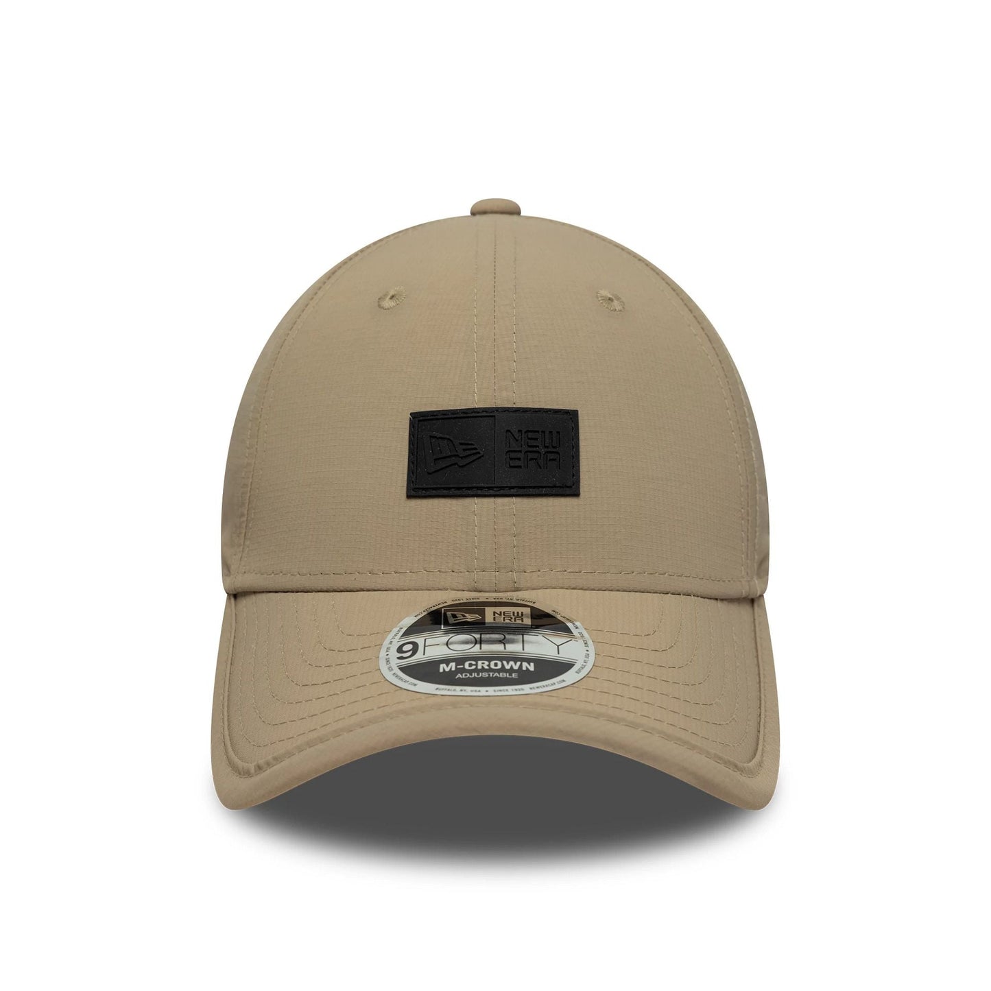 Pictured is this New Era Sport 9FORTY M-Crown in light beige. 2