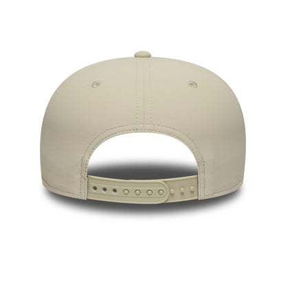 Pictured is this New Era Technical 19TWENTY cap in cream. 4