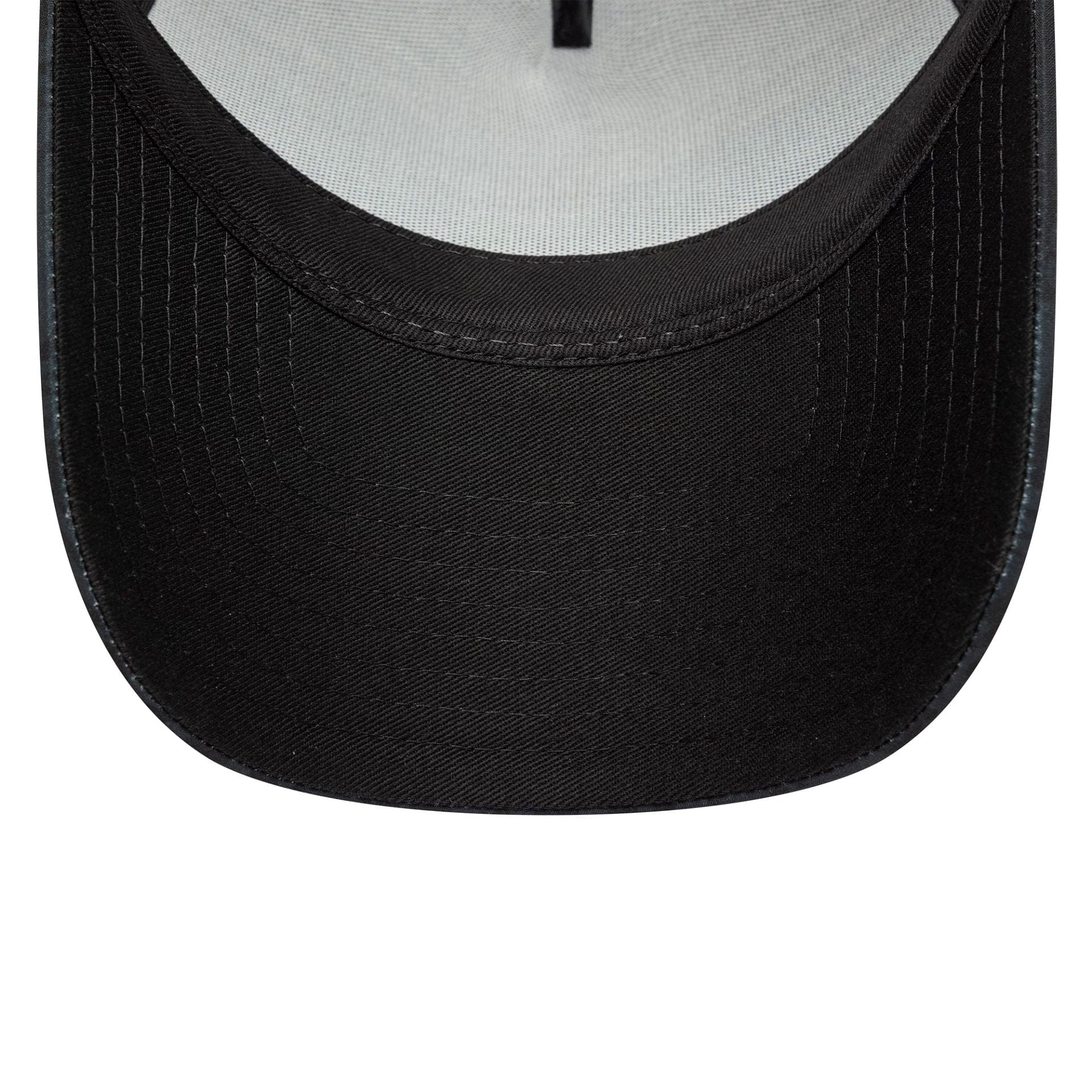 Pictured is this Manchester United FC All Over Print 9FORTY A-Frame Trucker in black. 5