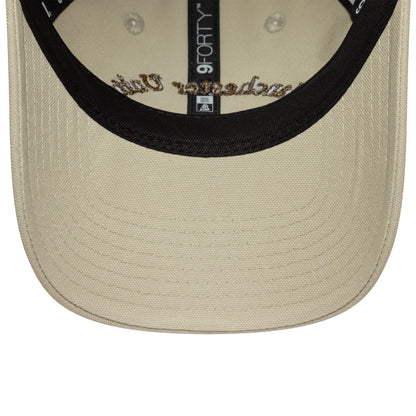 Pictured is this Womens Wordmark Manchester United FC 9FORTY in Cream. 5
