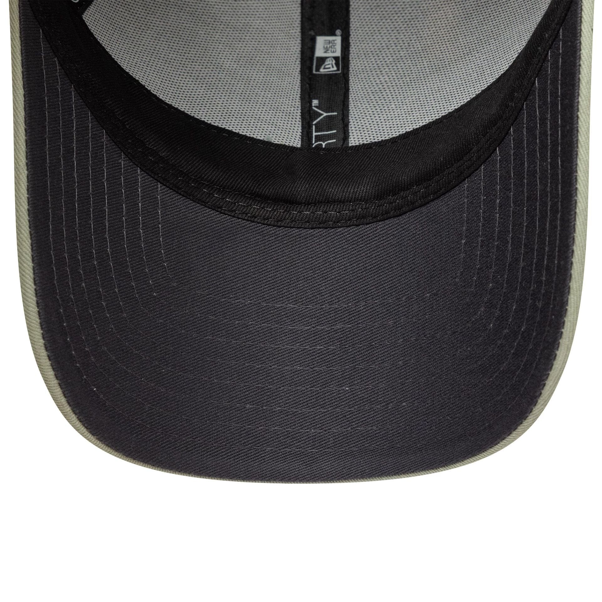 Pictured is this Tottenham Hotspur FC 9FORTY adjustable cap in pastel green. 2
