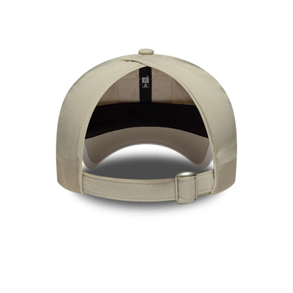 Pictured is this Womens Red Bull Racing Pony Tail in light beige. 2