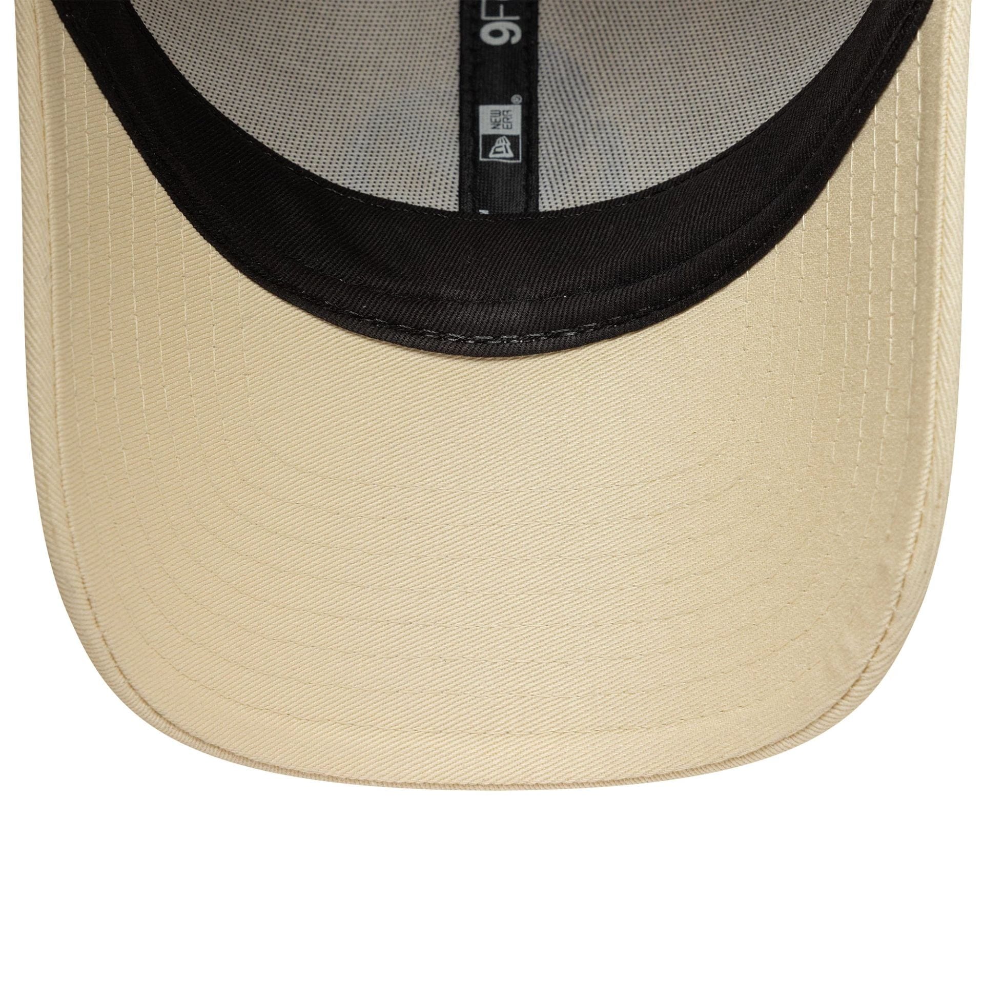 Pictured is this Essential Vespa 9FORTY in light beige. 5