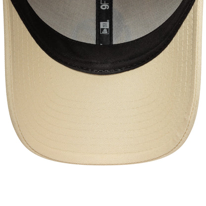 Pictured is this Essential Vespa 9FORTY in light beige. 5