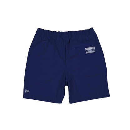 The model is wearing this MLB Match LA Dodgers Oversized Shorts in dark blue. 2