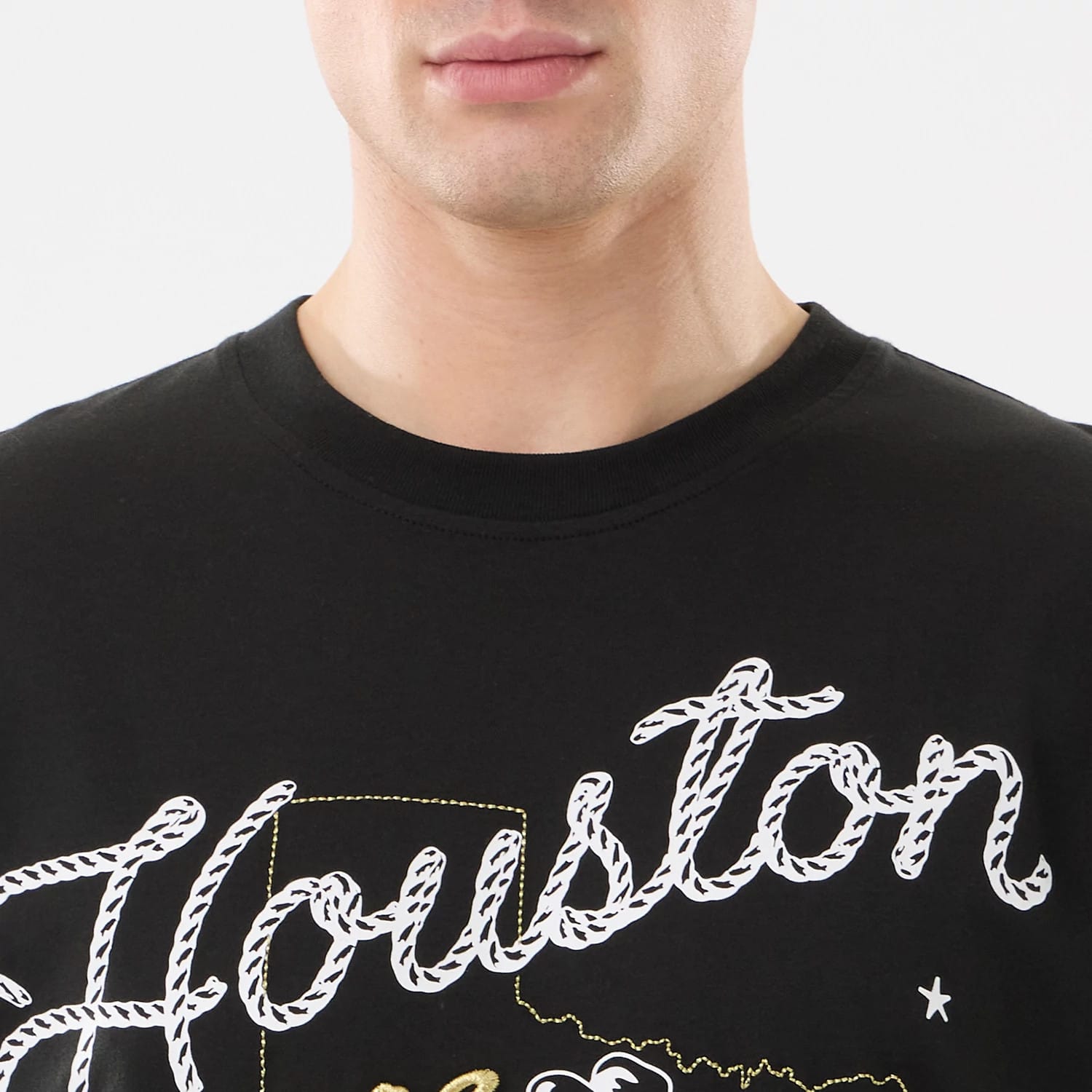 The model is wearing this MLB Cowboy Graphic Houston Astros T-Shirt in black. 4