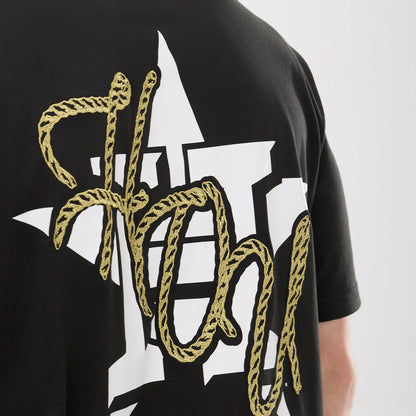 The model is wearing this MLB Cowboy Graphic Houston Astros T-Shirt in black. 6