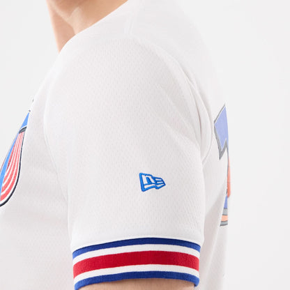 The model is wearing this Warner Brothers Space Jam Mesh Jersey in white. 5