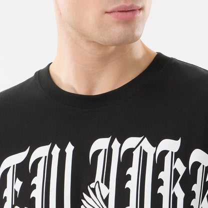 The model is wearing this MLB Script Graphic New York Yankees T-Shirt in black. 5