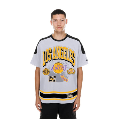 The model is wearing this NBA Sport Classic LA Lakers T-Shirt in white. 1