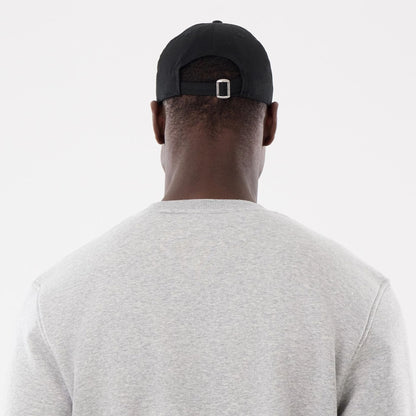 The model is wearing this MLB Sport Classic Toronto Blue Jays Crew Neck Sweater in grey. 5