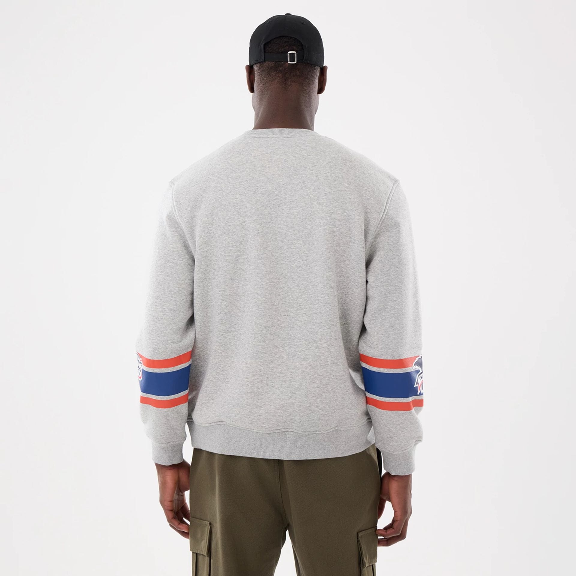 The model is wearing this MLB Sport Classic Toronto Blue Jays Crew Neck Sweater in grey. 2