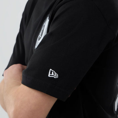 The model is wearing this NFL Graphic Las Vegas Raiders T-Shirt in black. 6