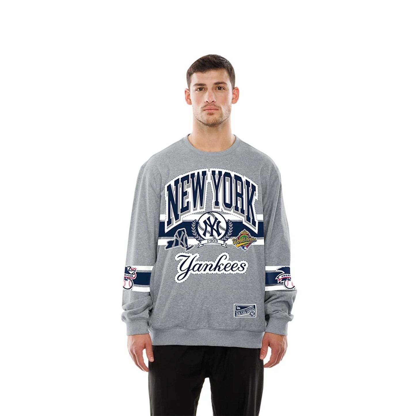 The model is wearing this MLB Sport Classic New York Yankees Crew Neck Sweater in grey. 1
