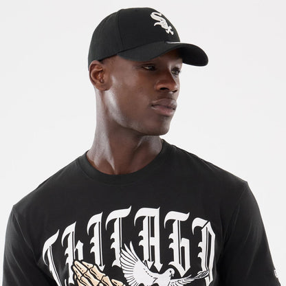 The model is wearing this MLB Script Graphic Chicago White Sox T-Shirt in black. 5