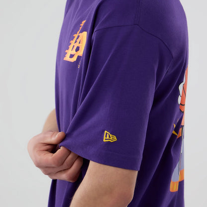 The model is wearing this NBA Graphic LA Lakers T-Shirt in purple. 6