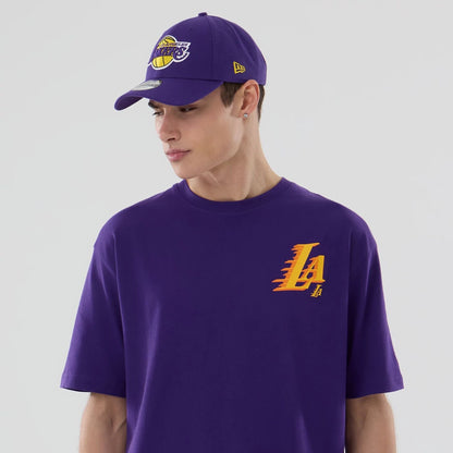 The model is wearing this NBA Graphic LA Lakers T-Shirt in purple. 7