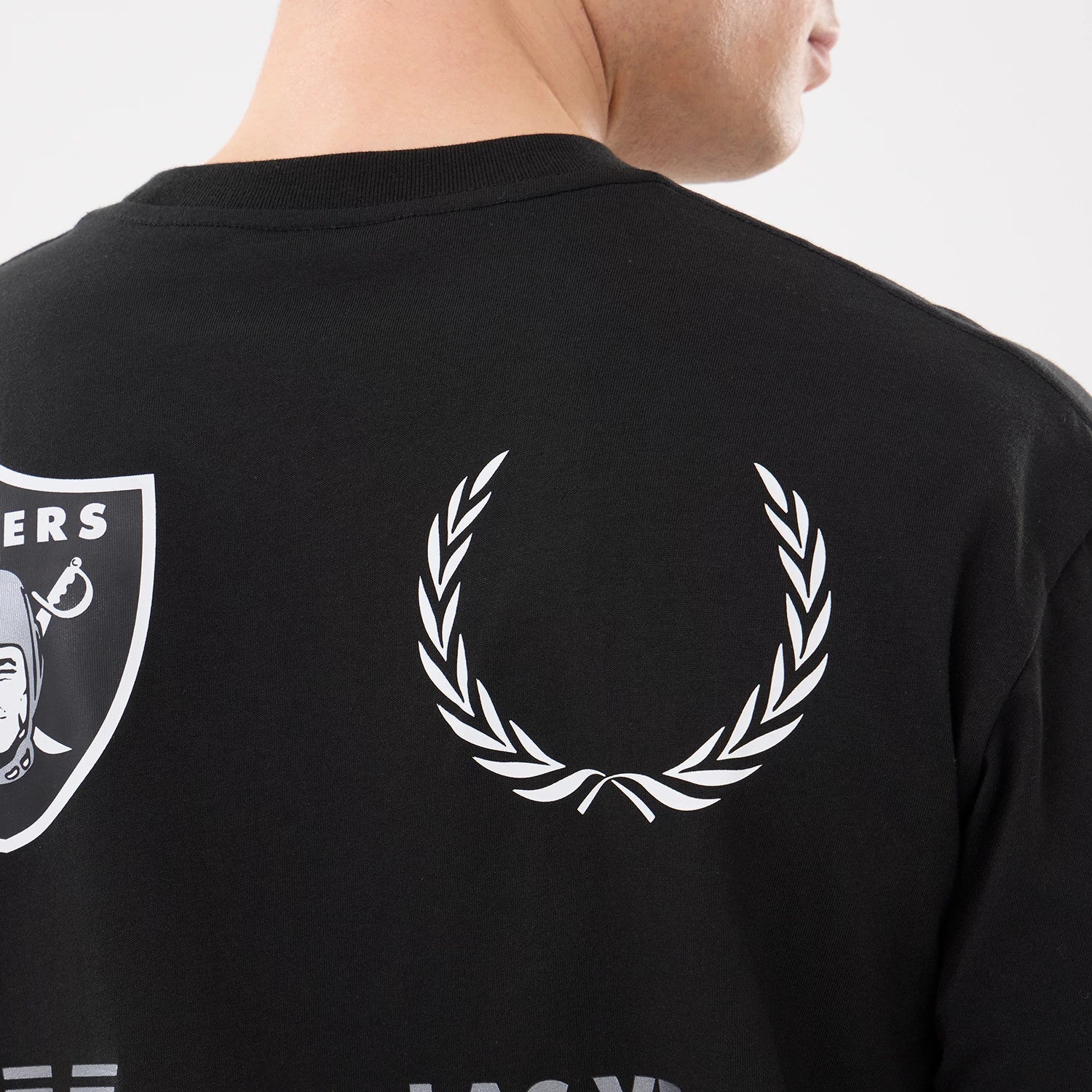 The model is wearing this NFL Match Las Vegas Raiders T-Shirt in black. 4