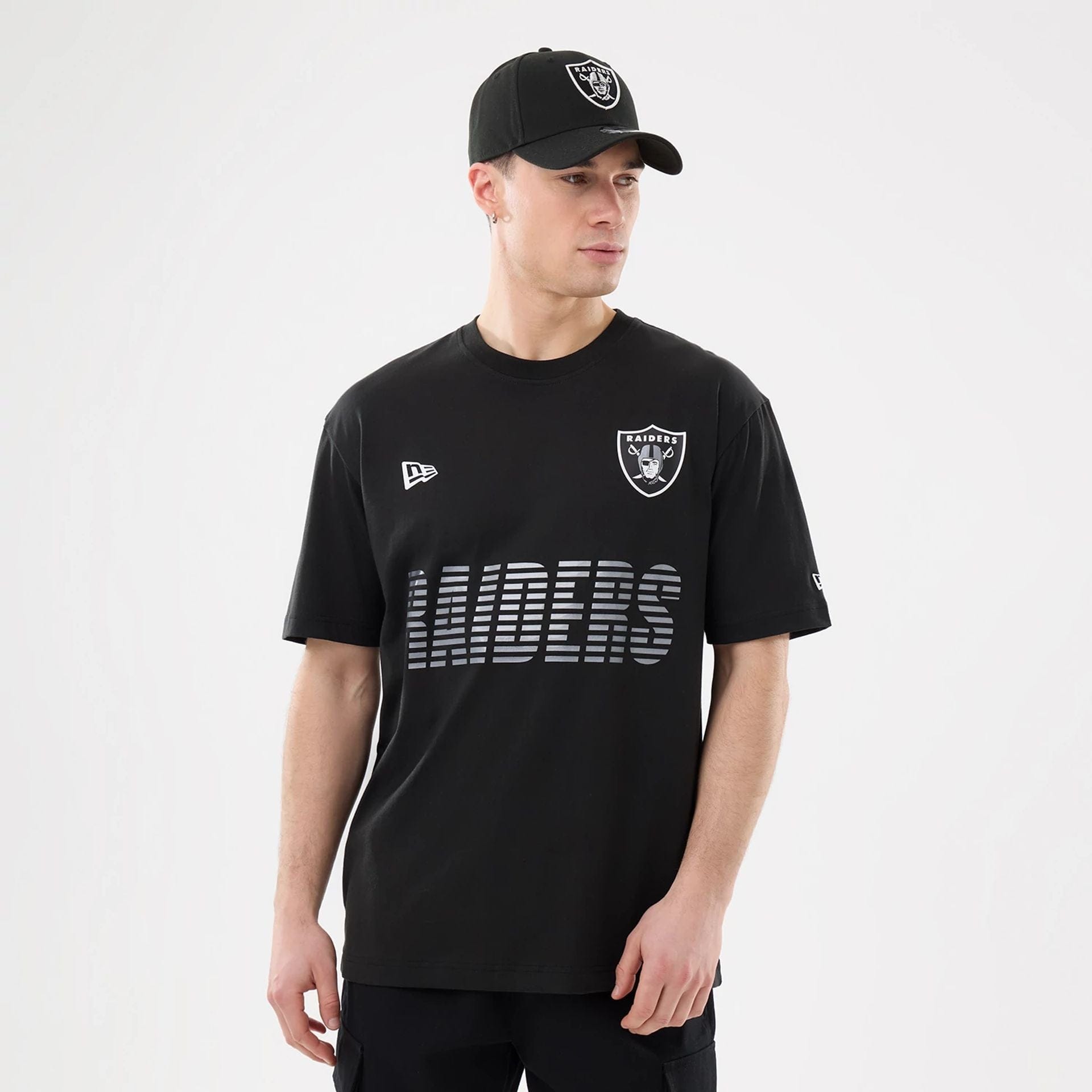 The model is wearing this NFL Match Las Vegas Raiders T-Shirt in black. 1