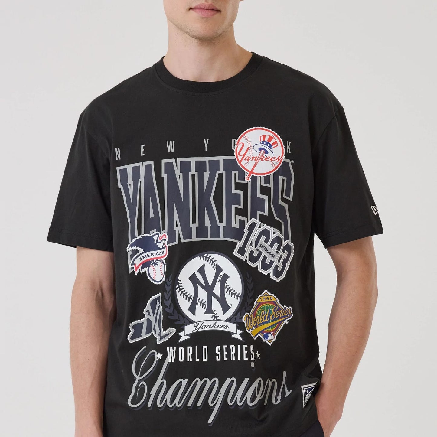 The model is wearing this MLB Sport Classic New York Yankees T-Shirt in black. 5