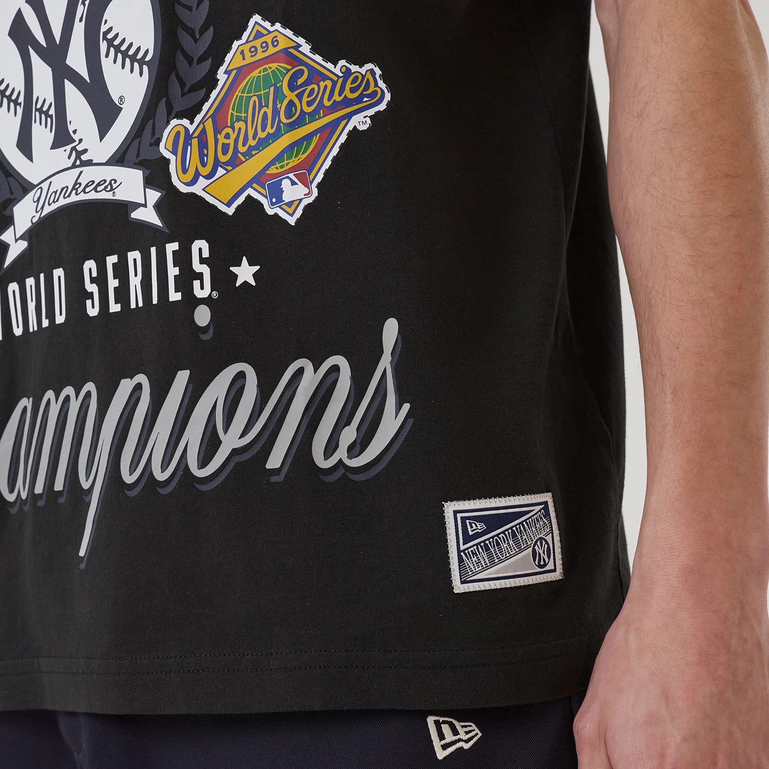 The model is wearing this MLB Sport Classic New York Yankees T-Shirt in black. 4