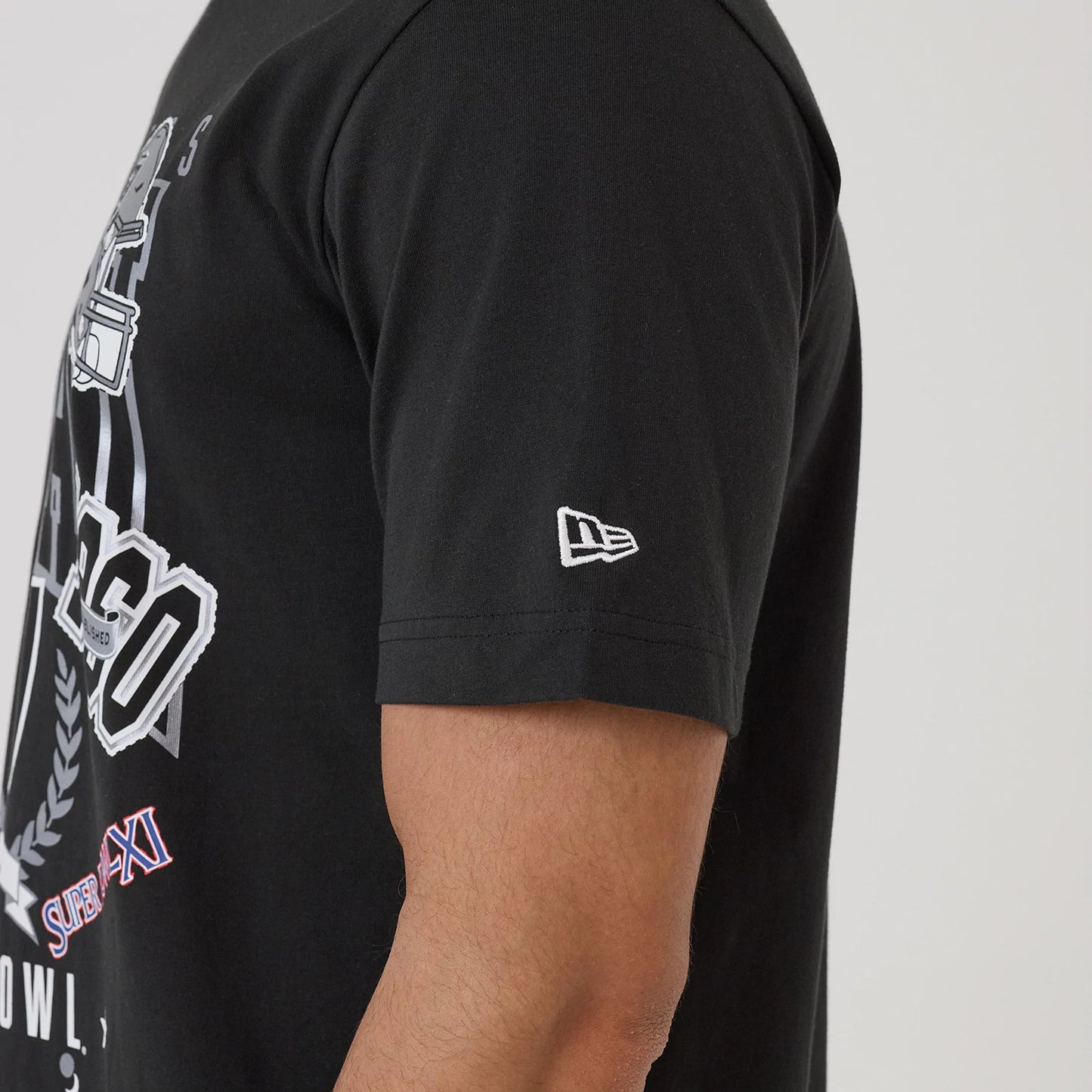 The model is wearing this NFL Sport Classic Las Vegas Raiders T-Shirt in black. 5
