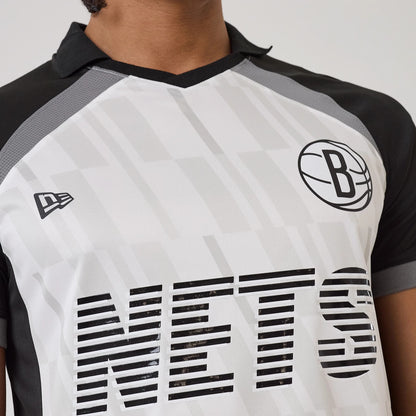 The model is wearing this NBA Match Brooklyn Nets T-Shirt in black. 3