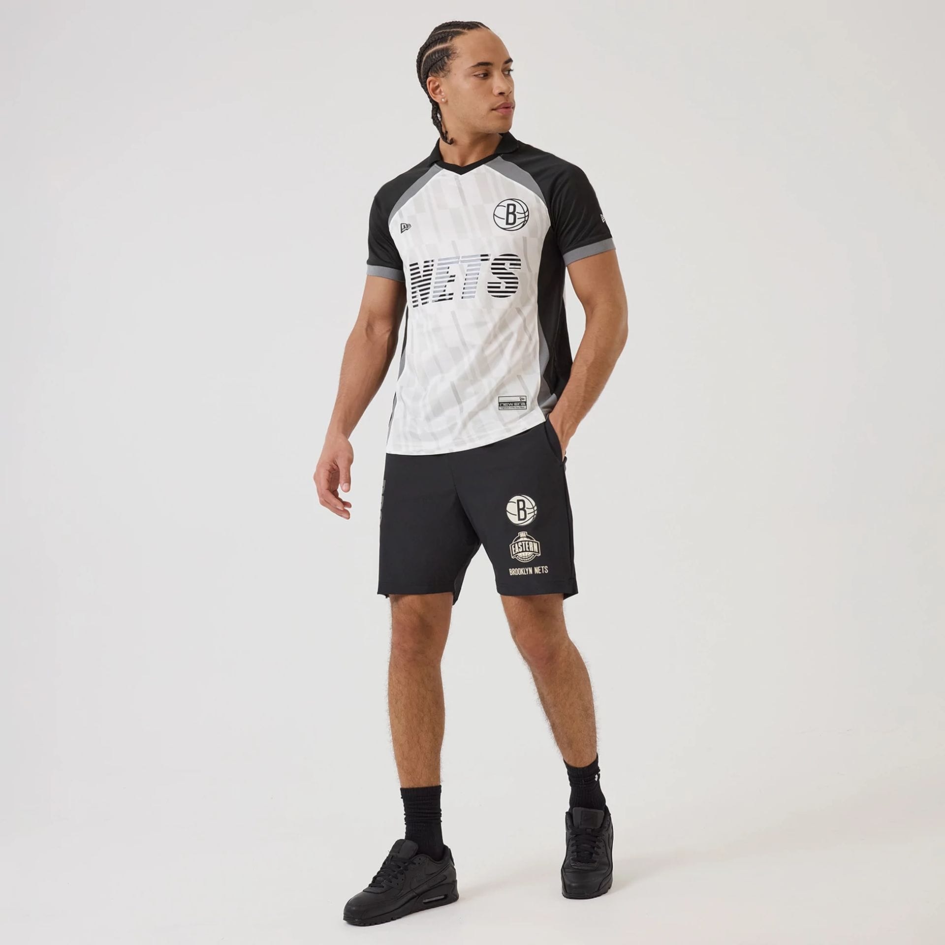 The model is wearing this NBA Match Brooklyn Nets T-Shirt in black. 8