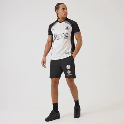 The model is wearing this NBA Match Brooklyn Nets T-Shirt in black. 8