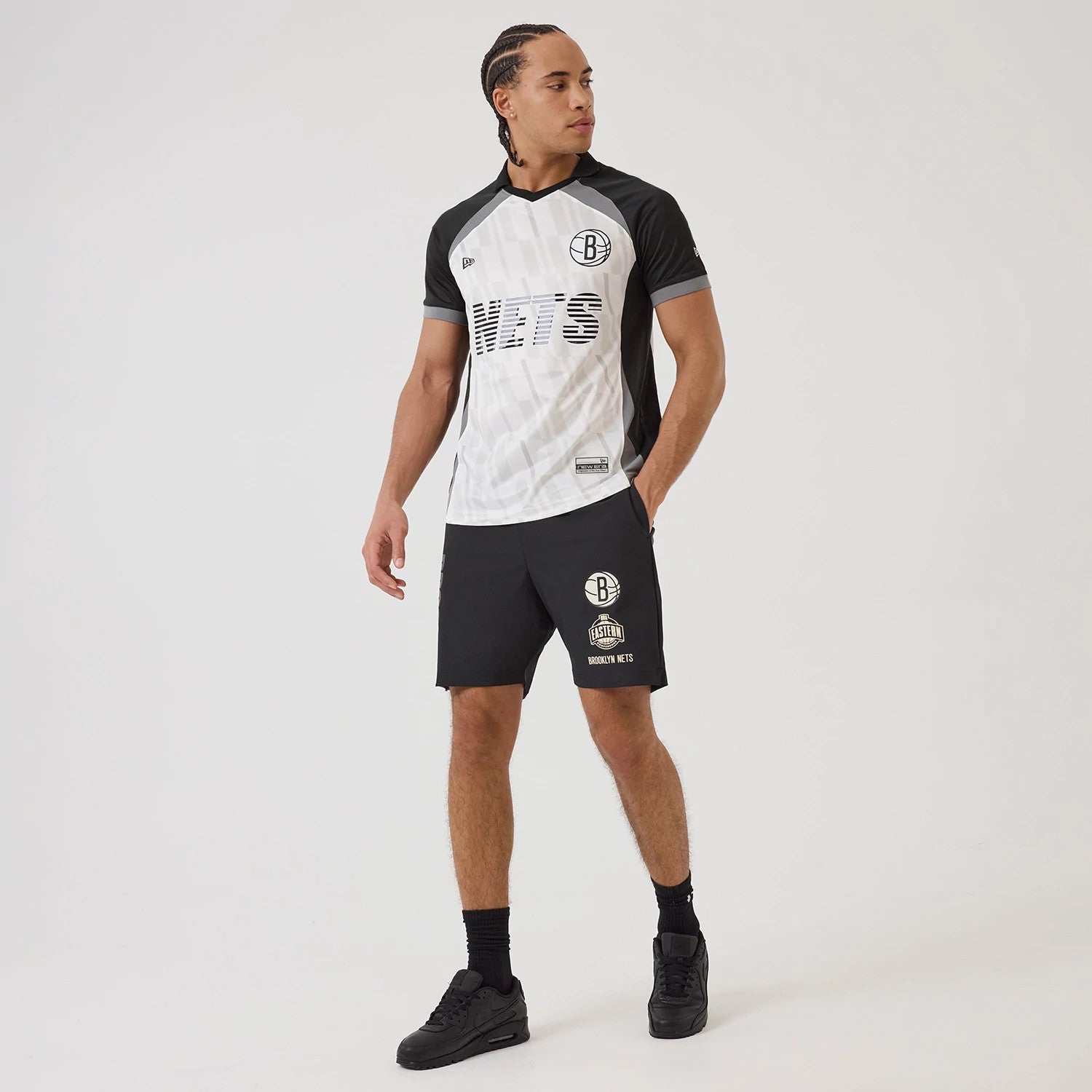 The model is wearing this NBA Match Brooklyn Nets T-Shirt in black. 8