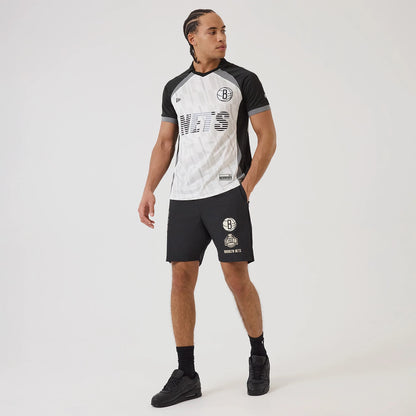 The model is wearing this NBA Match Brooklyn Nets T-Shirt in black. 8