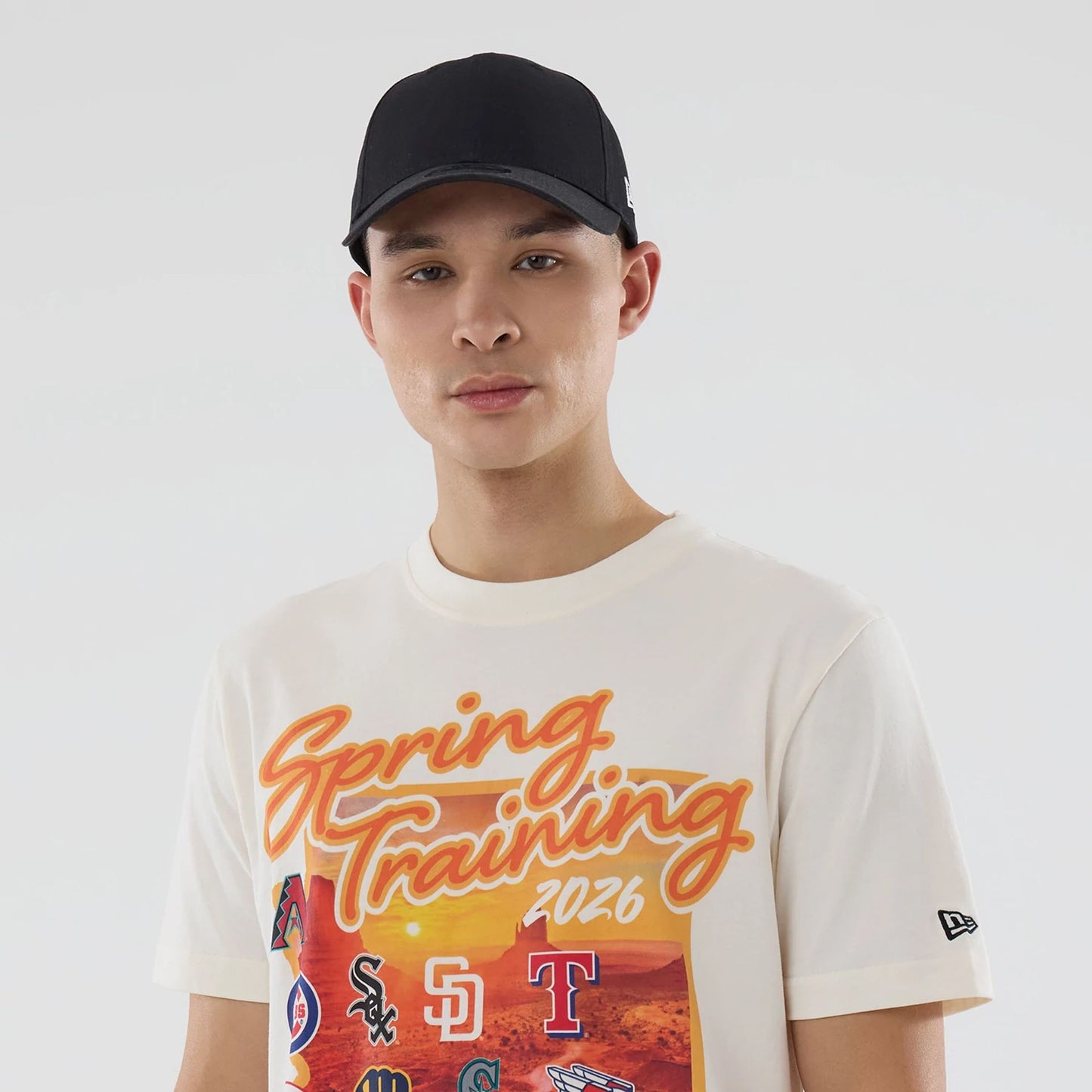 The model is wearing this MLB Spring Training 2026 Cactus League Logo T-Shirt in Cream. 3