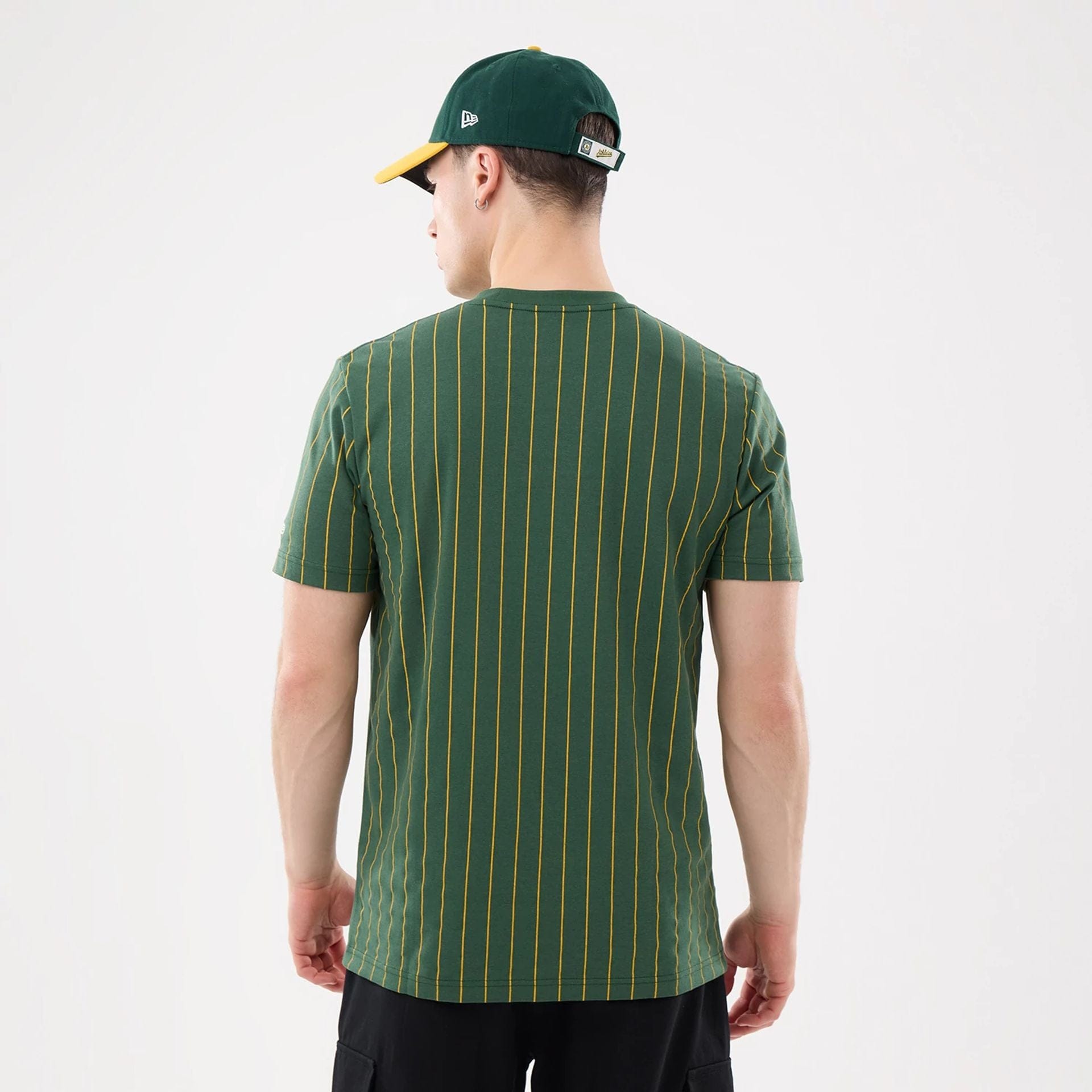 The model is wearing this MLB Pinstripe Athletics T-Shirt in dark green. 2