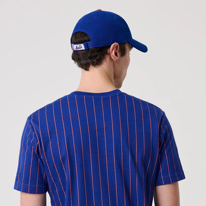 The model is wearing this MLB Pinstripe New York Mets T-Shirt in blue. 6