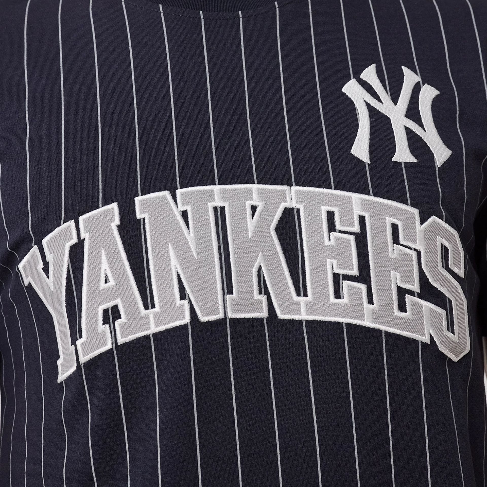 The model is wearing this MLB Pinstripe New York Yankees T-Shirt in navy. 3