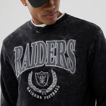 The model is wearing this NFL Las Vegas Raiders Laurel Wreath Crew Neck Sweater in black. 6