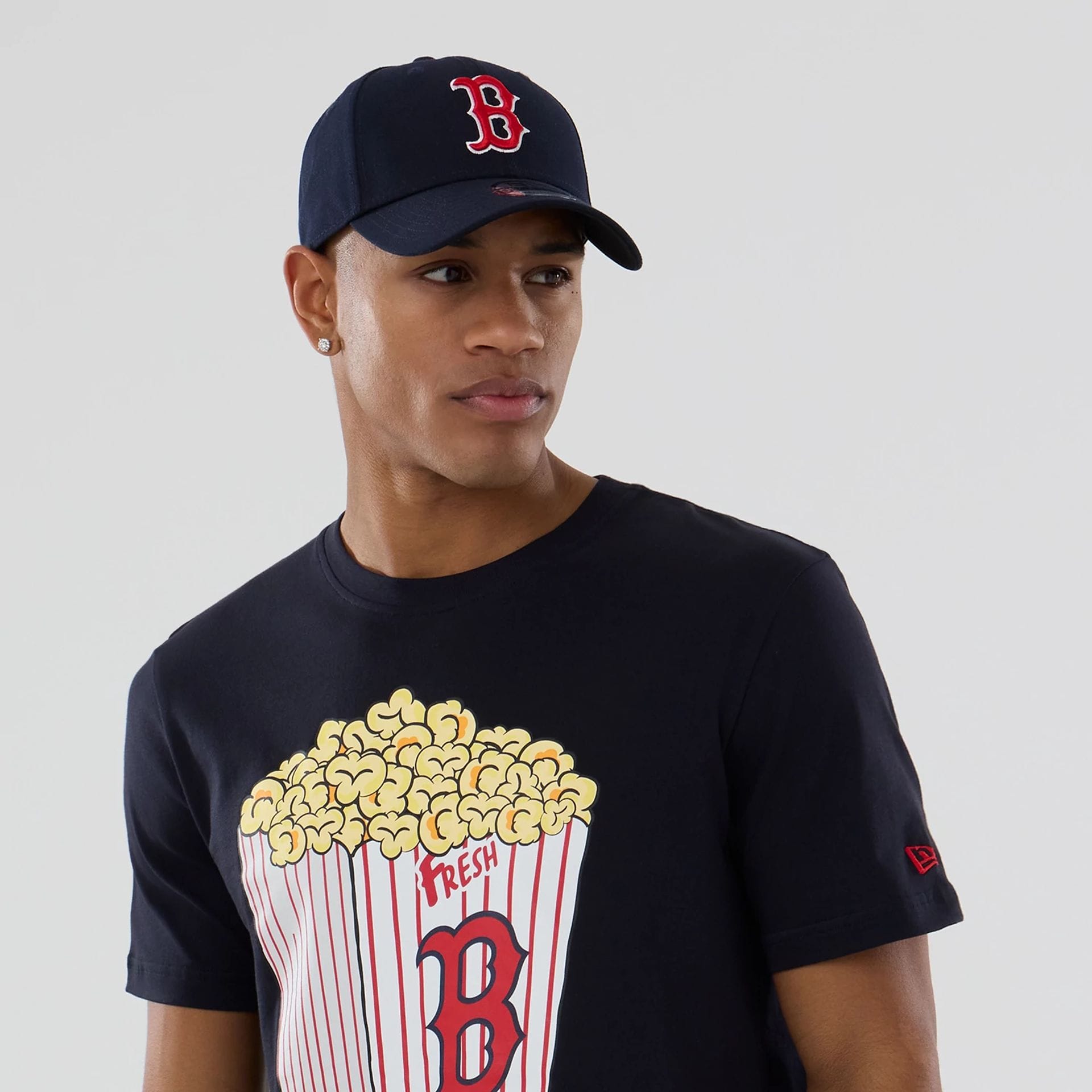 The model is wearing this MLB Popcorn Boston Red Sox T-Shirt in navy. 6