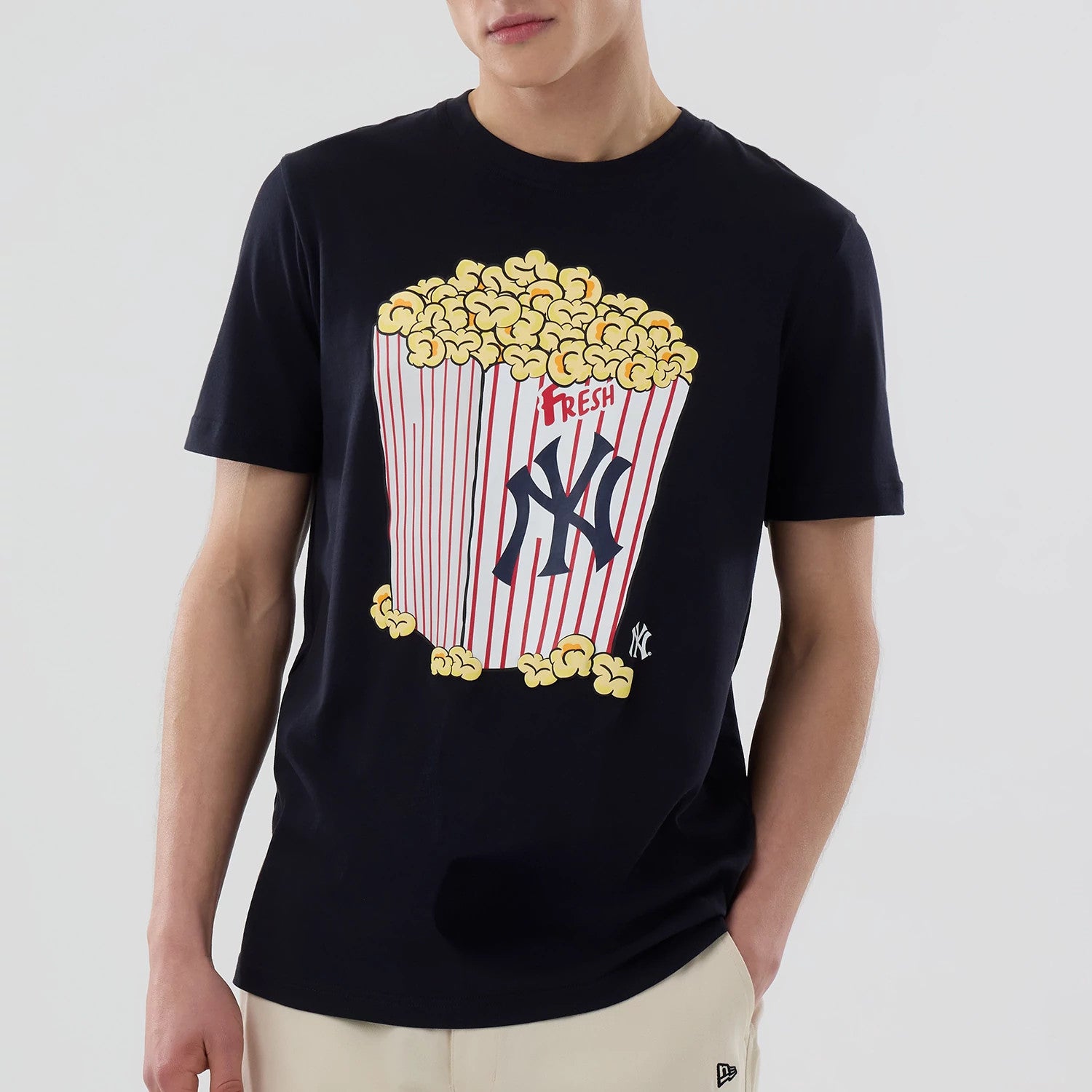 The model is wearing this MLB Popcorn New York Yankees T-Shirt in navy. 3