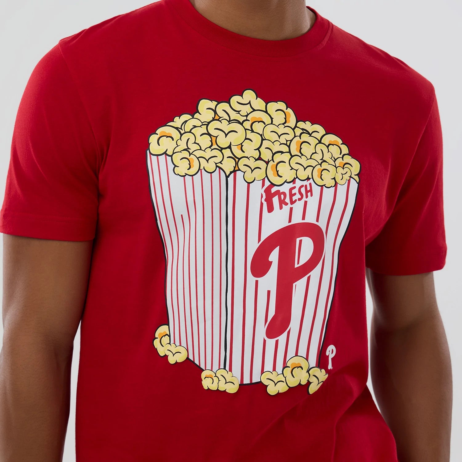 The model is wearing this MLB Popcorn Philadelphia Phillies T-Shirt in red. 3