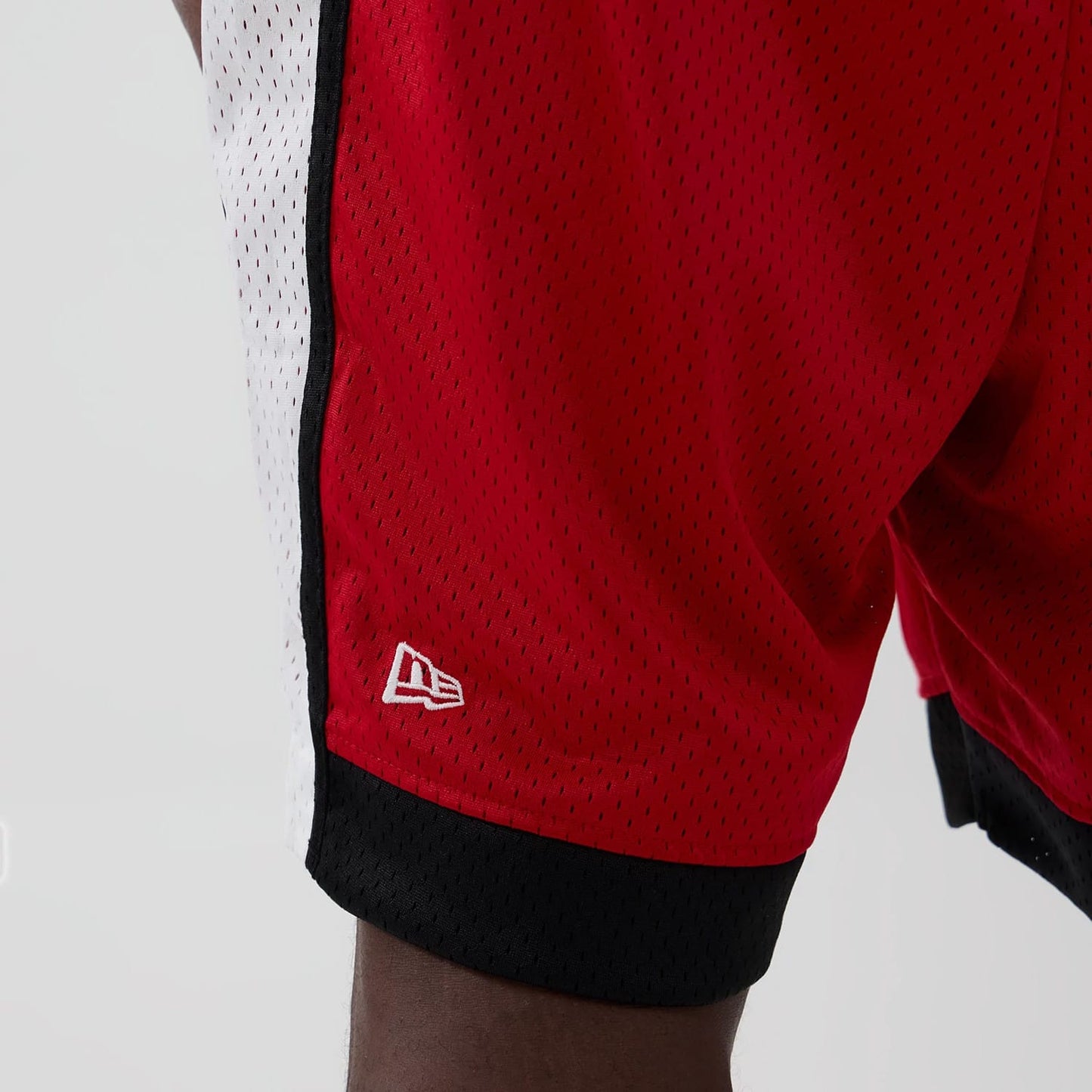 The model is wearing these NFL Kansas City Chiefs Mesh Shorts in red. 4