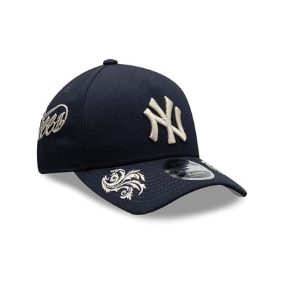 Pictured is this MLB Script New York Yankees 9FORTY M-Crown A-Frame Adjustable cap in navy. 1