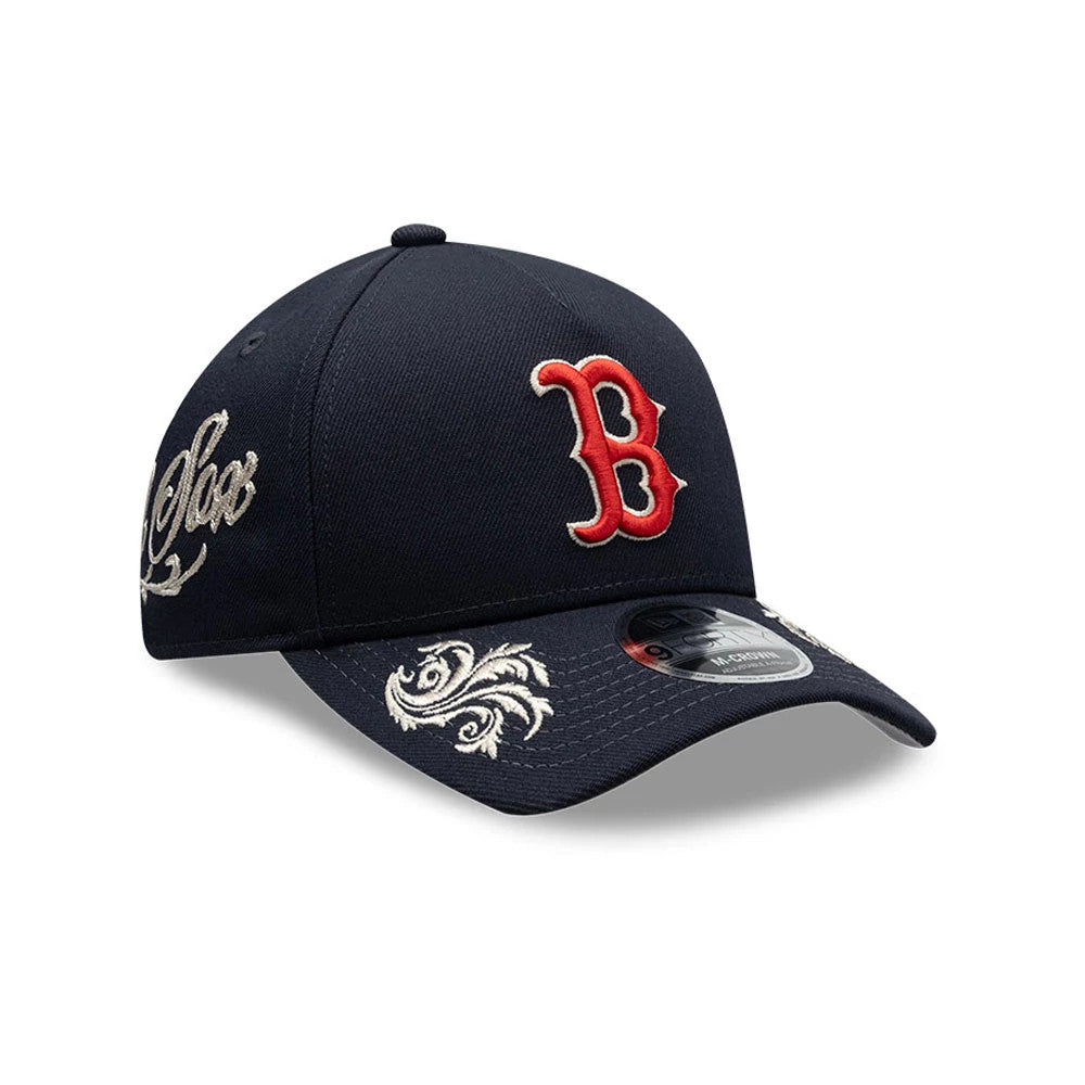 Pictured is this MLB Script Boston Red Sox 9FORTY M-Crown A-Frame Adjustable cap in navy. 1