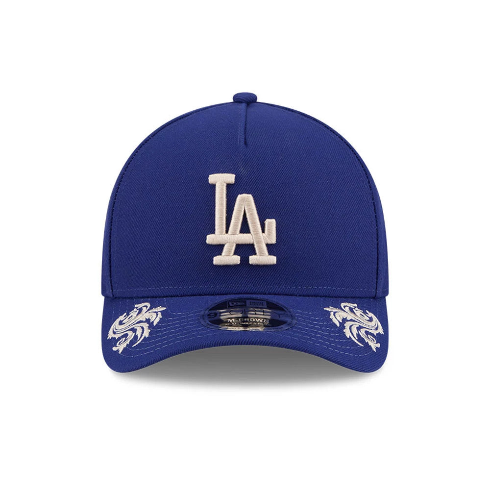 Pictured is this MLB Script LA Dodgers 9FORTY M-Crown A-Frame Adjustable cap in dark blue. 3